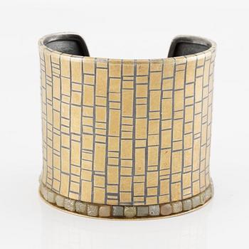 A cuff in silver and 18K gold with rough diamonds, Peter Schmid/Atelier Zobel.