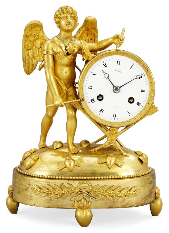 An Empire mantel clock, signed Hahn à Paris.