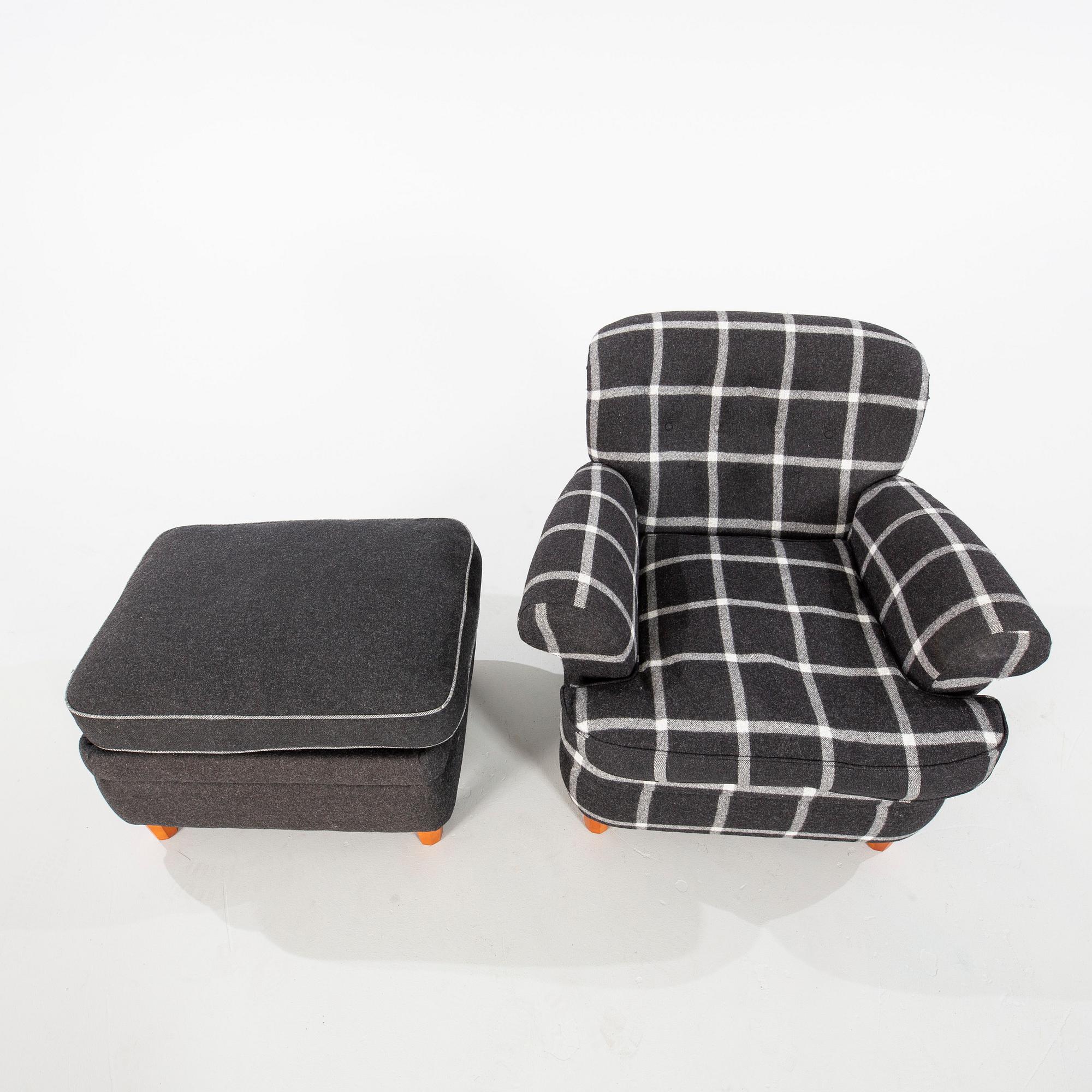 Josef Frank, a model '568' armchair and stool, Firma Svenskt Tenn, Sweden.