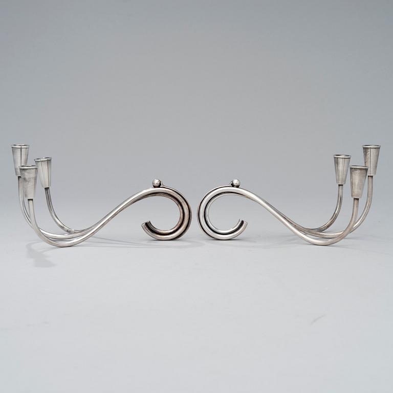 A pair of silver plated candelabra and a candelabrum, FDG, Denmark, mid 20th century.