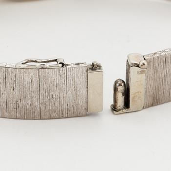 A Movado 18K white gold ladies watch.