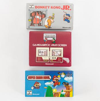 GAME & WATCH, "Donkey Kong jr", "Mario Bros" samt "Super Mario Bros" i förpackningar, Nintendo, 1982-1988.