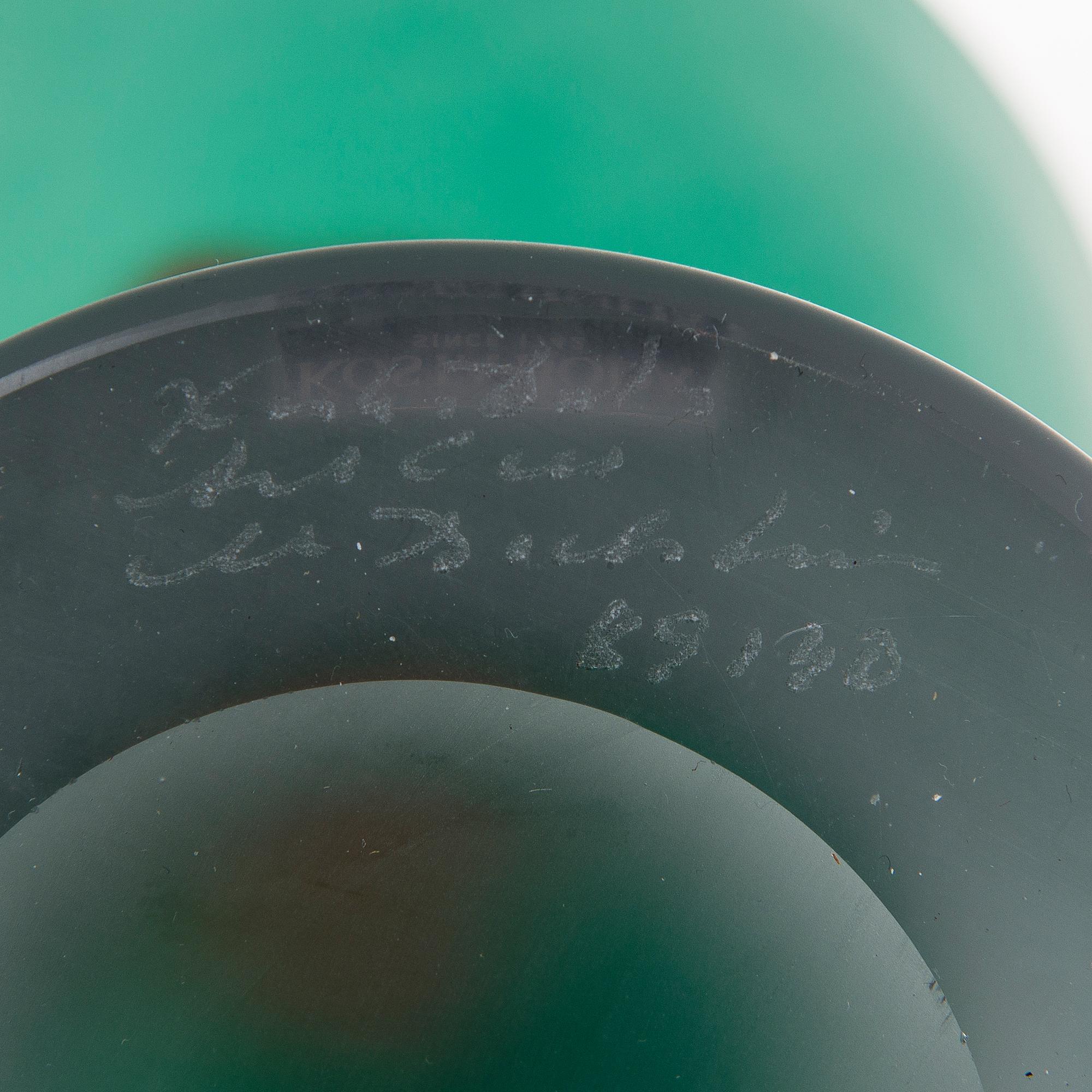 A glass bowl and decanter, signed, Kosta Boda, second half of 20th Century.