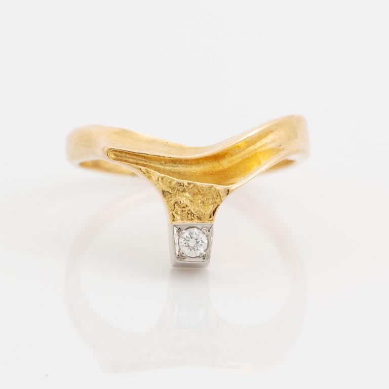 Björn Weckström, An 18K gold Lapponia ring DIamond promise" set with a round brilliant-cut diamond.