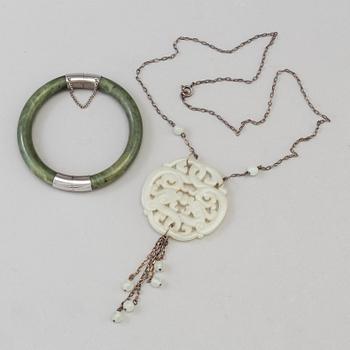 A Chinese armband and a pendant, 20th Century.