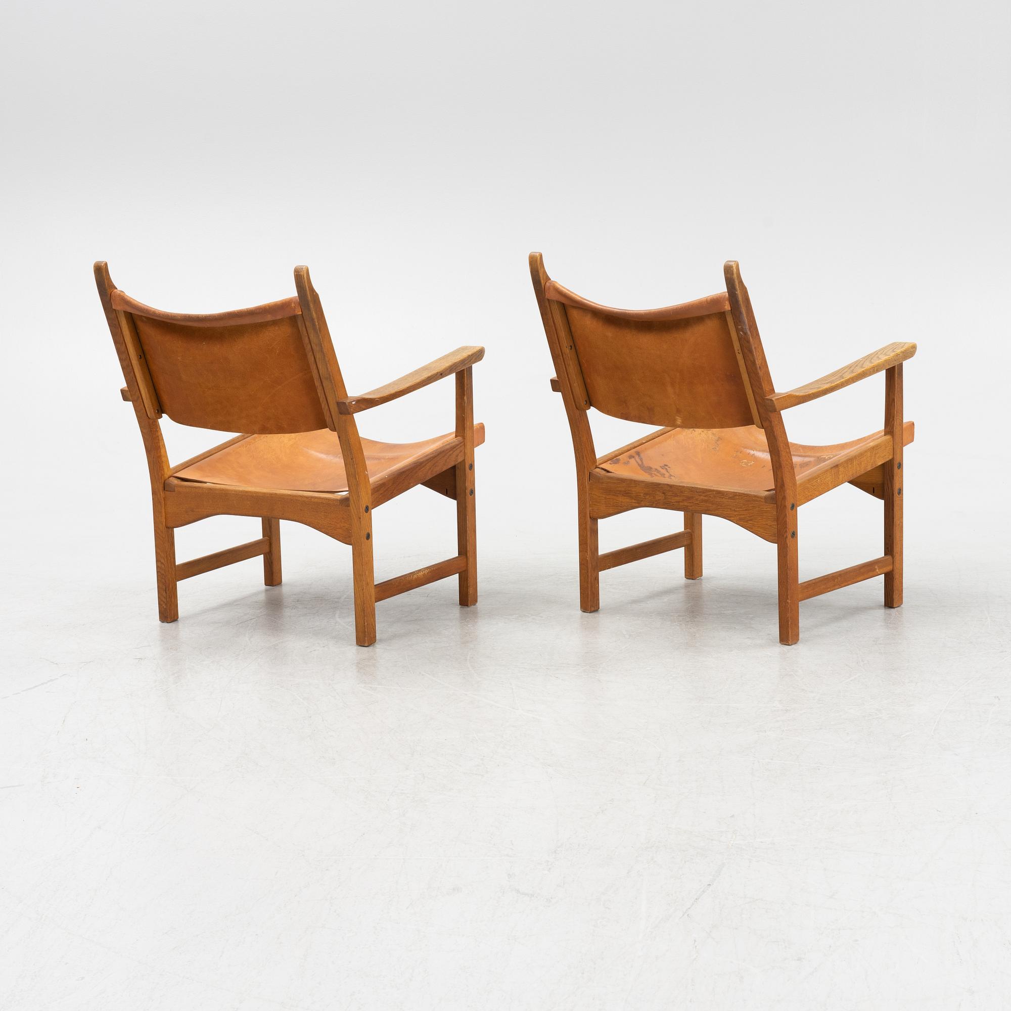 Carl Malmström & Yngve Ekström, a pair of 'Caryngo' oak armchairs, Swedese, second half of the 20th century.