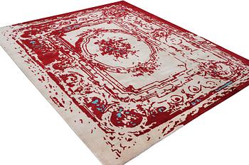 An oriental carpet, c. 300 x 248 cm.