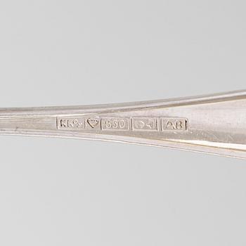 An 56-piece set of 'Chippendale' silver cutlery, Finnish hallmarks.