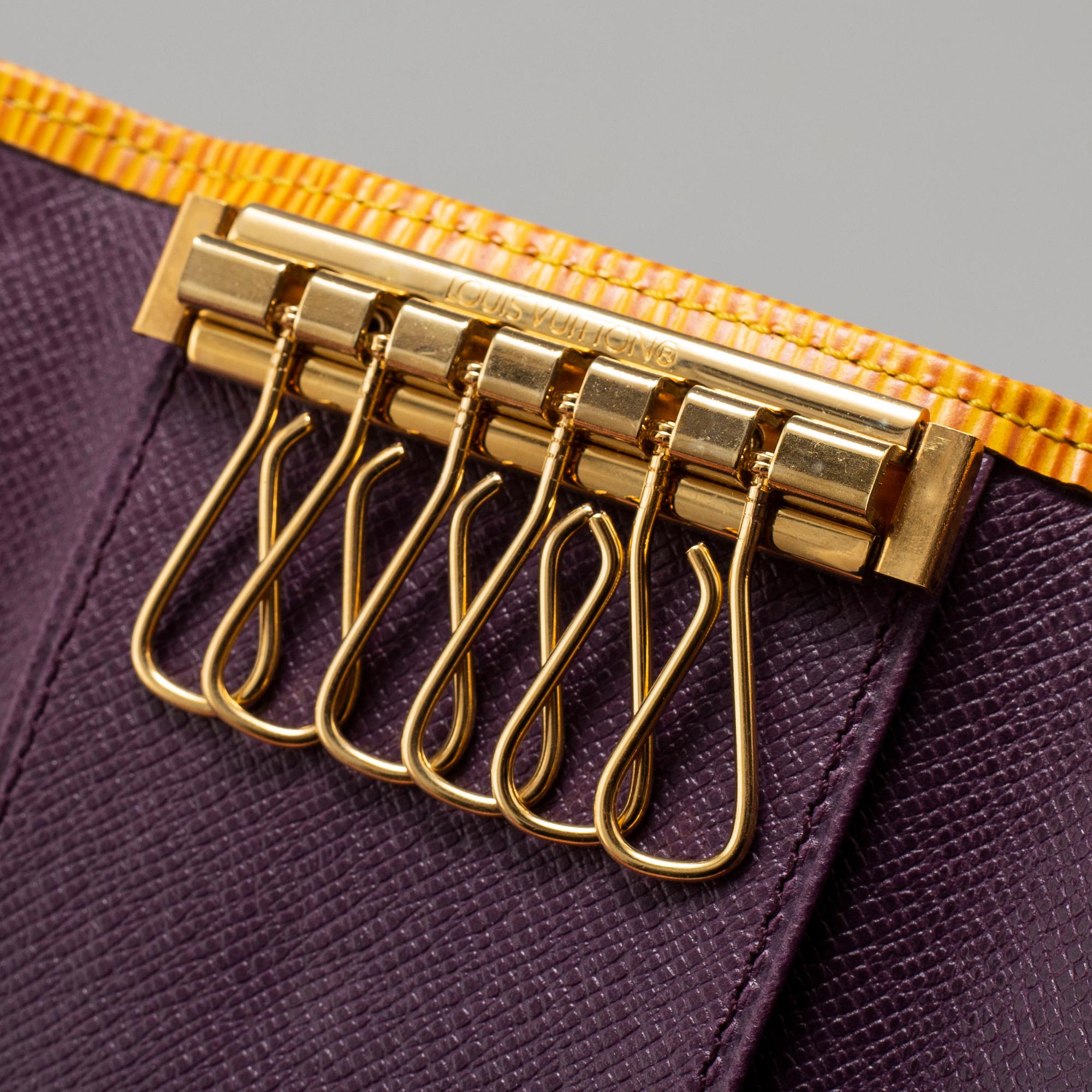 LOUIS VUITTON, a 'Marie Lou' wallet and a keyholder.