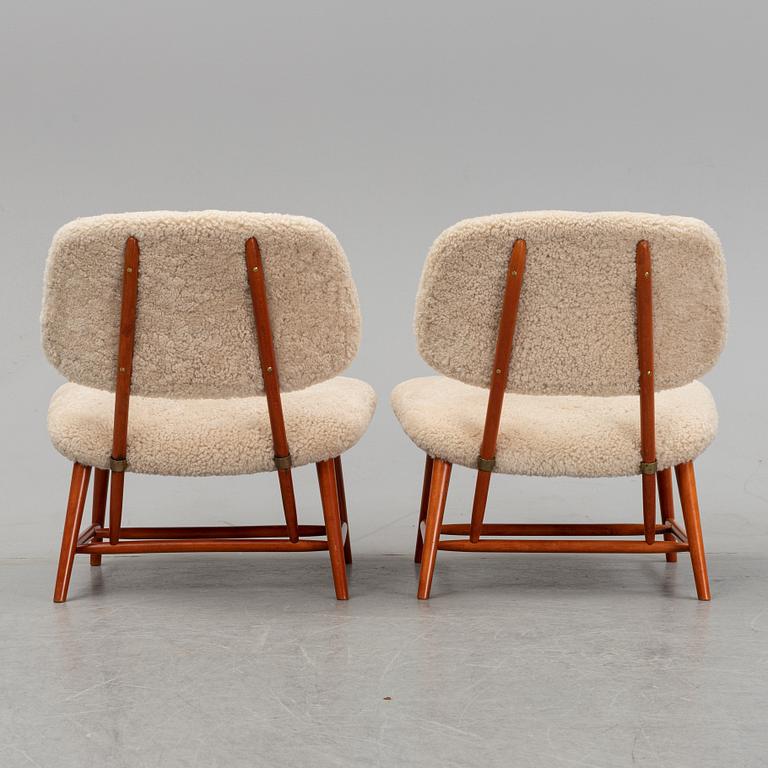 A 1950's pair of 'TeVe' easy chairs by Alf Svensson.