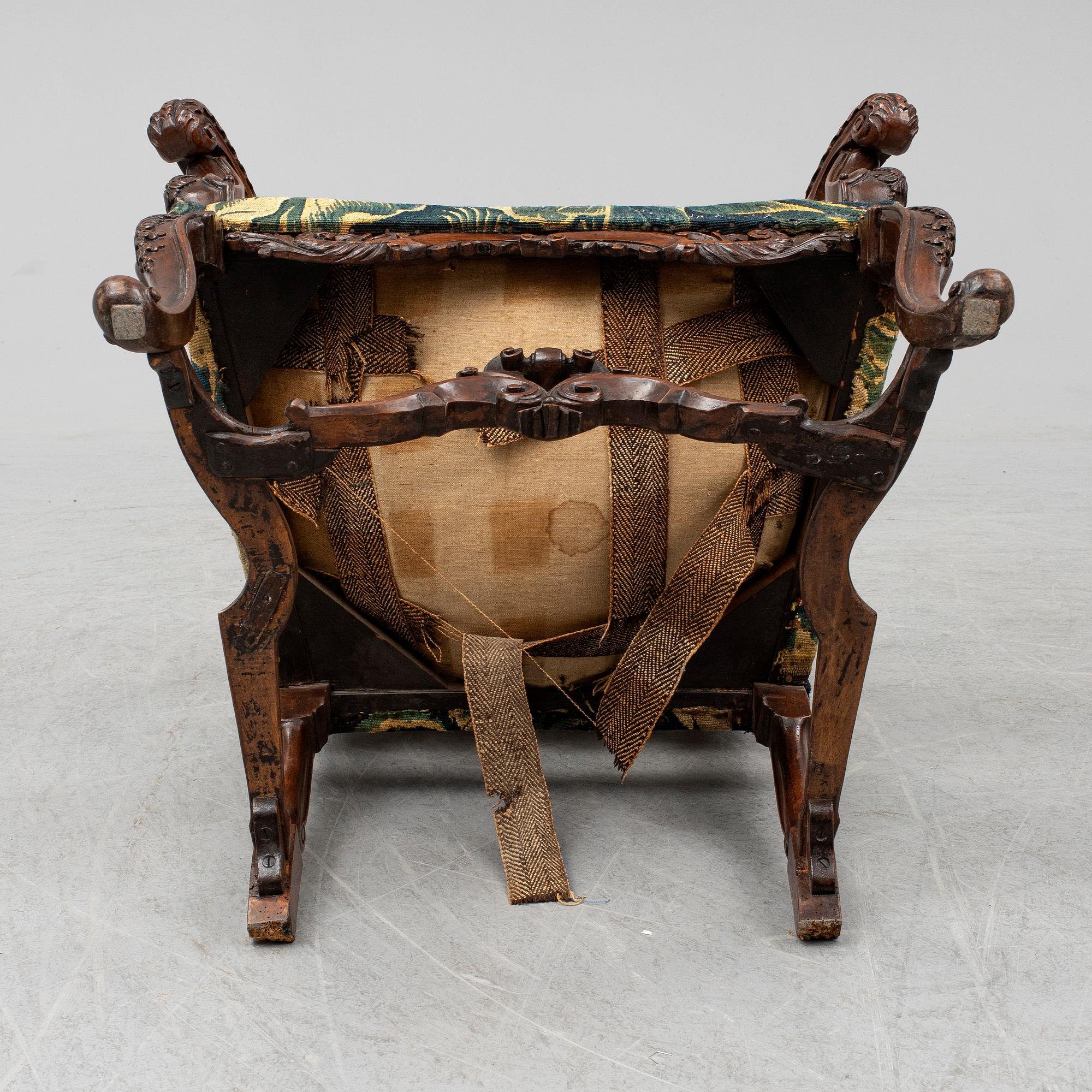 A 19th century baroque style armchair.