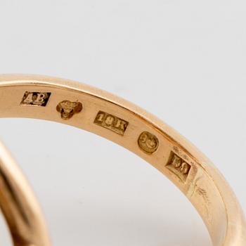 Ring, 18K guld med briljantslipade diamanter.