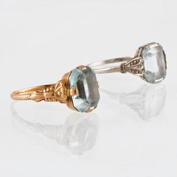 RINGAR, 2 st, 18K guld med fasettslipade syntetiska spineller delvis, Gustav Dahlgren & Co, Malmö, 1951. Vikt 4,5 gram.