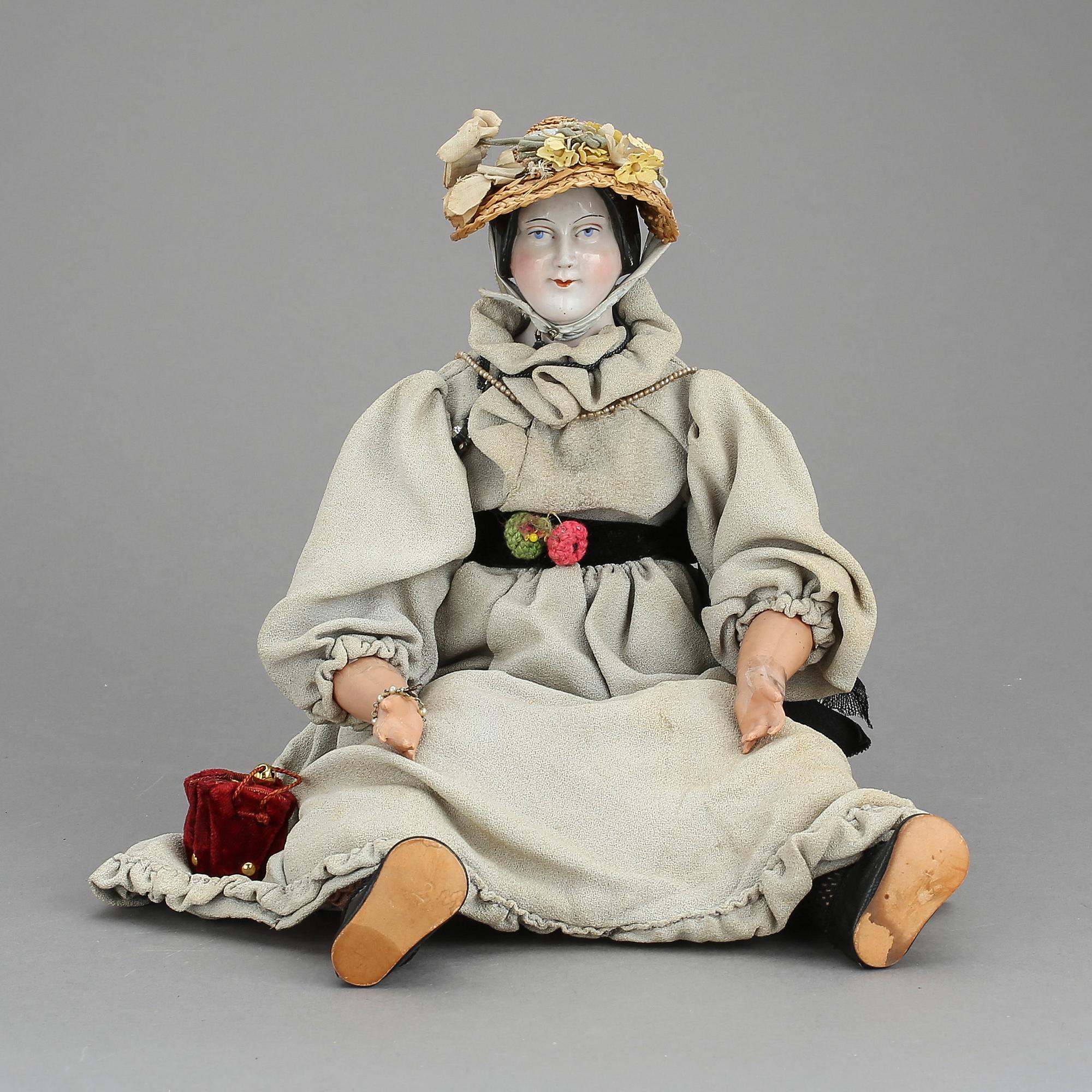 DAMDOCKA, så kallad "China head", Tyskland, 1800-talets senare del.