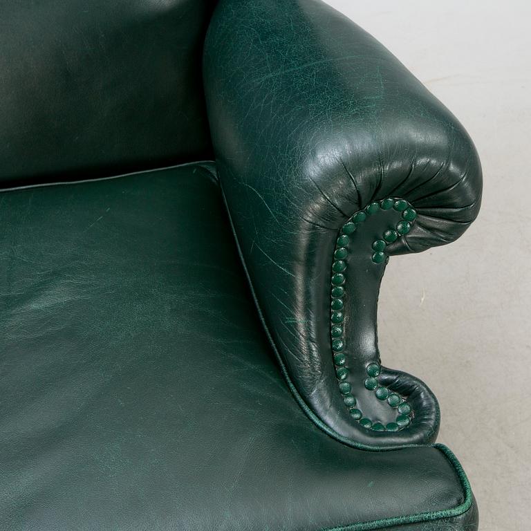 A  mid 1900s leather armchair.