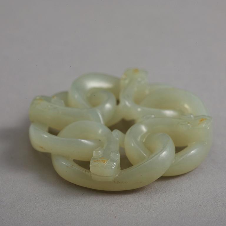 A carved Chinese nephrite pendant.