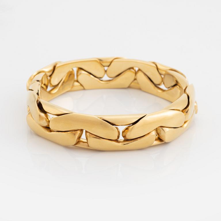An 18K gold necklace/bracelet combination.