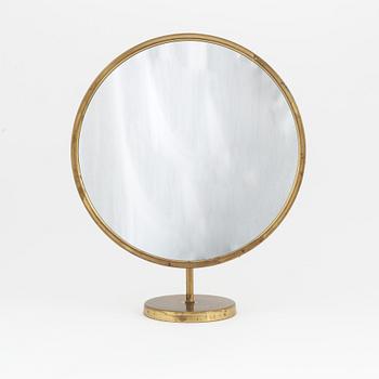A Swedish Modern brass table mirror, 1940's/50's.