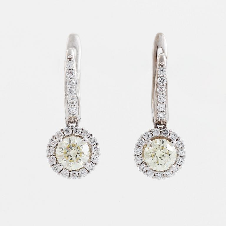 Brilliant cut diamond earrings.