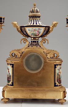 A French 'Sèvres' five piece gilt-bronze garniture, 19th Century, Signed P.D. Boucher.