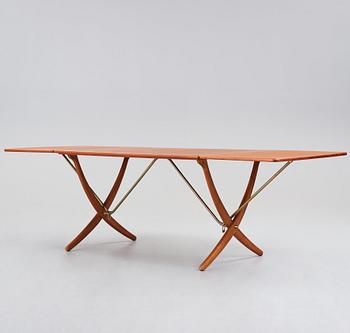 Hans J. Wegner, a teak, beech and brass dining table model "AT-314", for Andreas Tuck, Denmark 1950-60's.