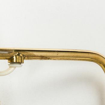 Paavo Tynell, a brass wall light model 9459, Idman, Finland 1960s.