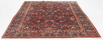 A semi-antique Sarouk carpet, c 275 x 185 cm.