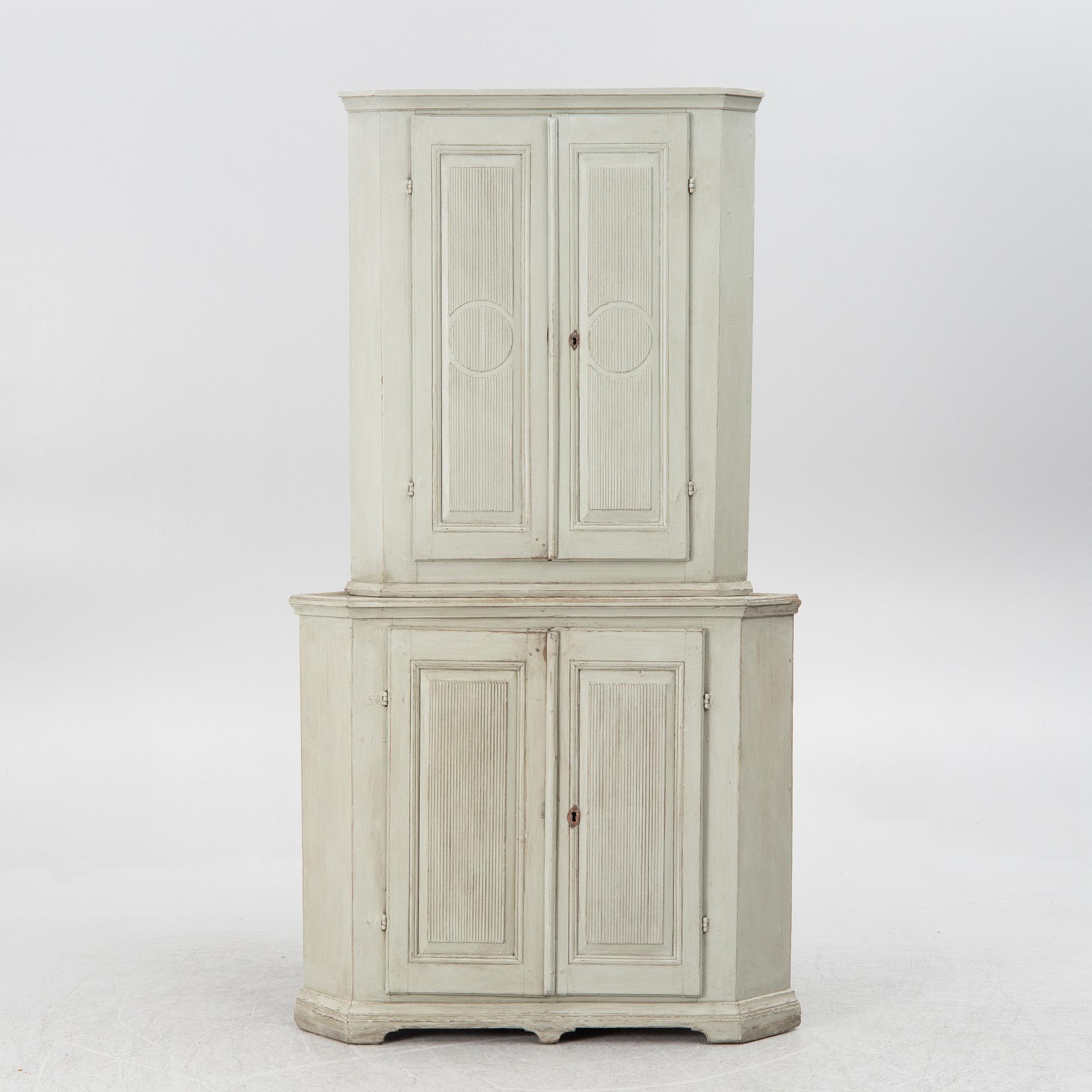 An early 19th century Gustavian corner cabinet, Sweden.