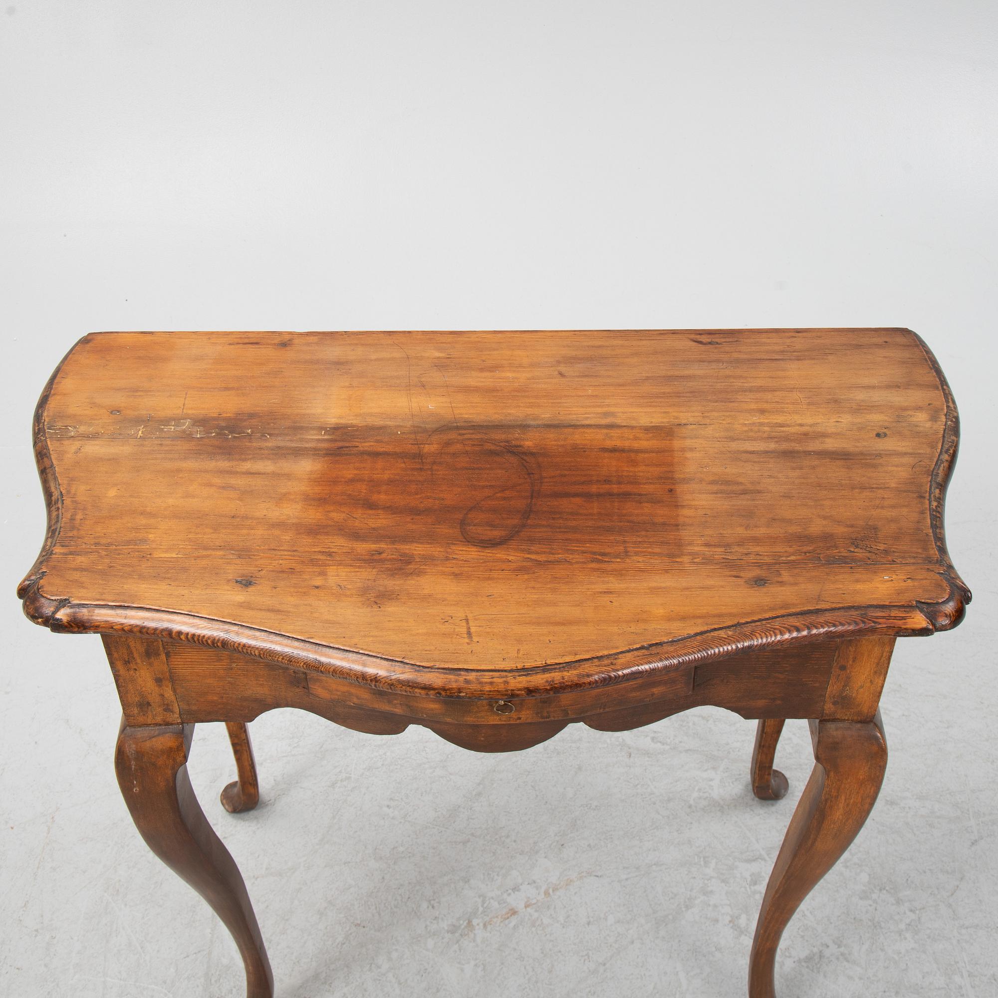 A rococo style side table, from around the year 1900.