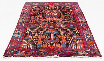 An oriental rug, ca 233 x 128 cm.