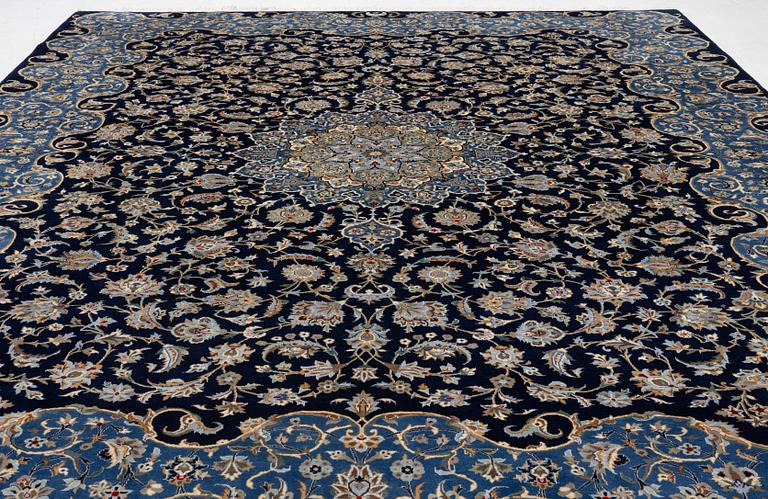 A Royal Keshan carpet, signed, c. 395 x 295 cm.
