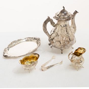 A Swedish silver Rococo style 4-piece coffee service, mark of Gewe, Malmö 1962-1978, and sugar tongs, Mylius, Norway.