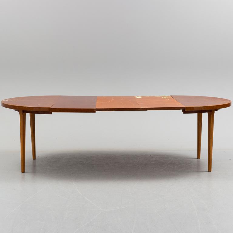 A 1940s mahogany veneer table.
