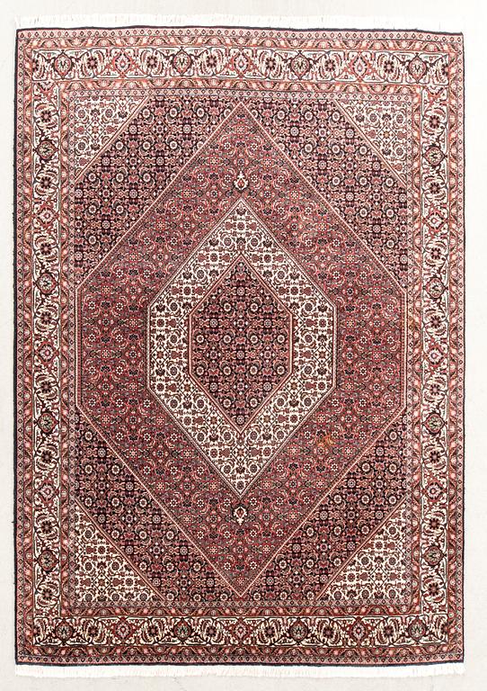 An old Bidjar carpet approx 240x174 cm.