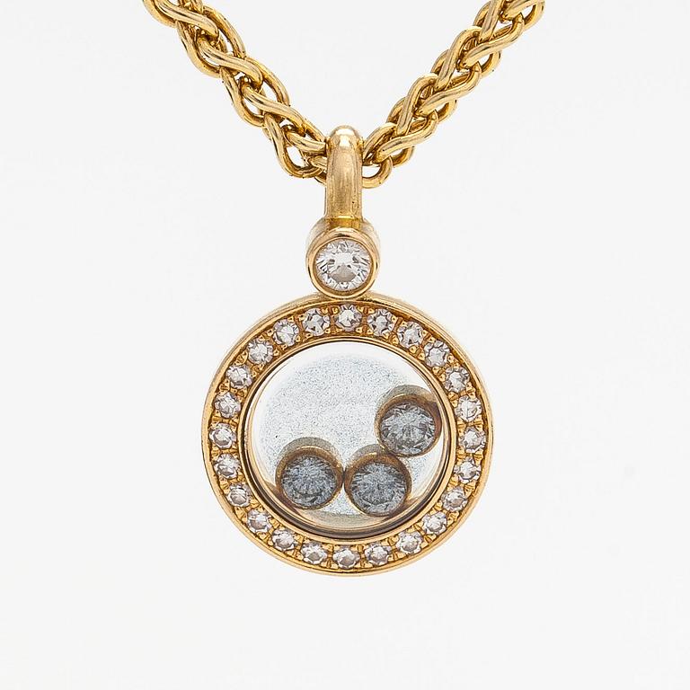 Chopard, an 18K gold 'Happy Diamonds' necklace with brilliant-cut diamonds.