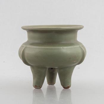 A Chinese celadon tripod censer, late Ming dynasty, for the Southeastern market.