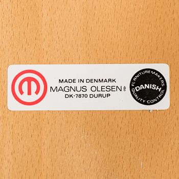 A set of six chairs by Magnus Olesen, Durup, Denmark.