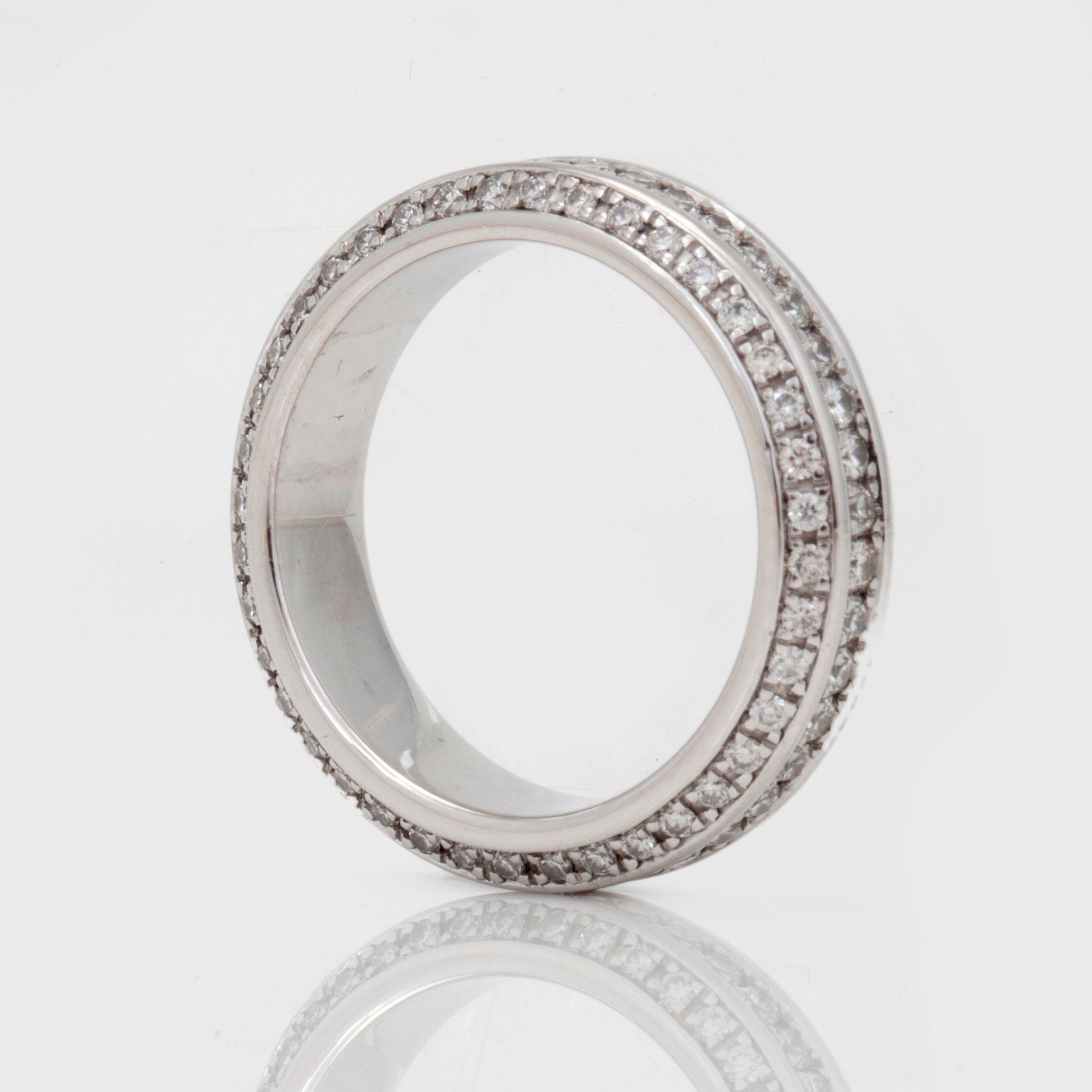 A brilliant-cut diamond eternity ring.