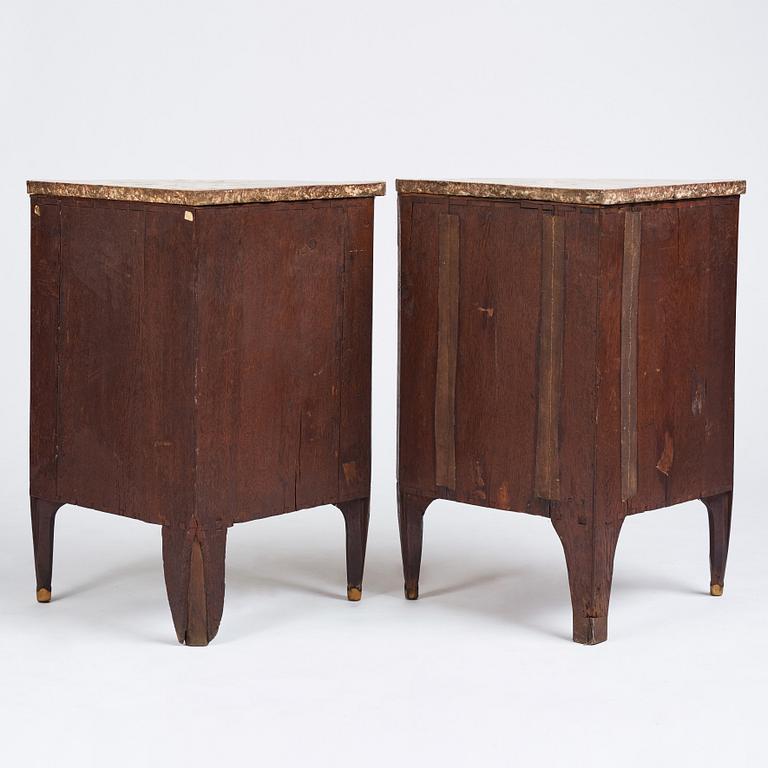 A pair of Louis XVI corner cupboards by Francois Gaspard Teunè (master in Paris from 1766), 18th century.