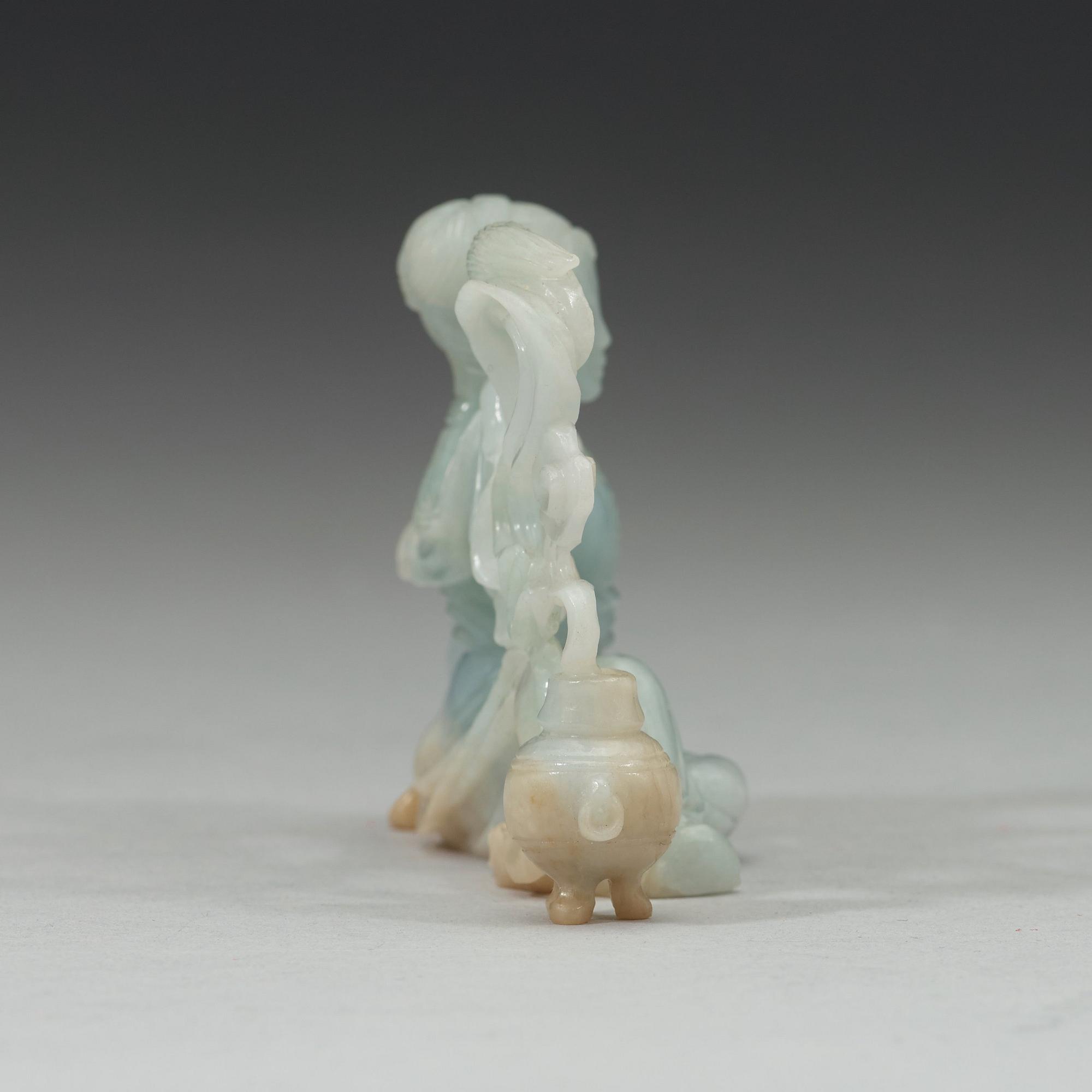 A Chinese nephrite figure of a lady, Qing dynasty (1644-1912).