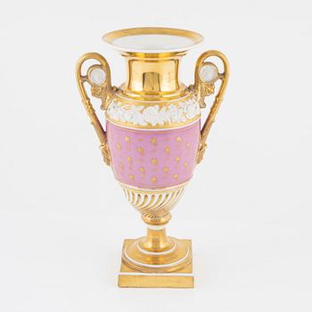 A gilt Empire porcelain vase, 19th Century.