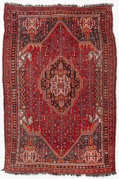 A Kashgai/Shiraz rug, semi-antique/antique, c. 200 x 135 cm.