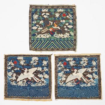 A group of three kesi rank badges with birds, Qing dynasty, 19th century.