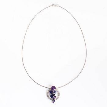 A 14K/18K white gold necklace, with amethysts, cordierites and diamonds.