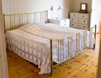 103. A BRASS BED,