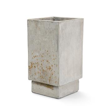 A contemporary concrete flowerpot.