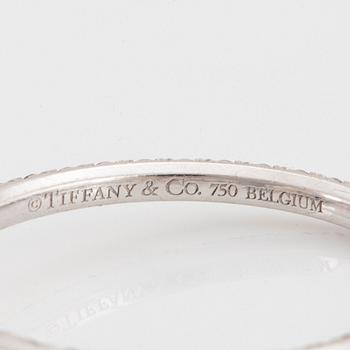 A pair of Tiffany "Metro" 18K white gold hoops set with round brilliant-cut diamonds.