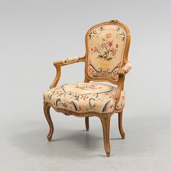 A mid 18th century rococo armchair.