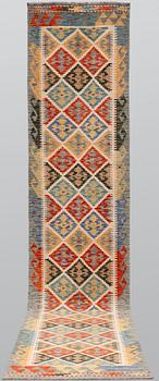 A Kilim rug, approx. 401 x 82 cm.