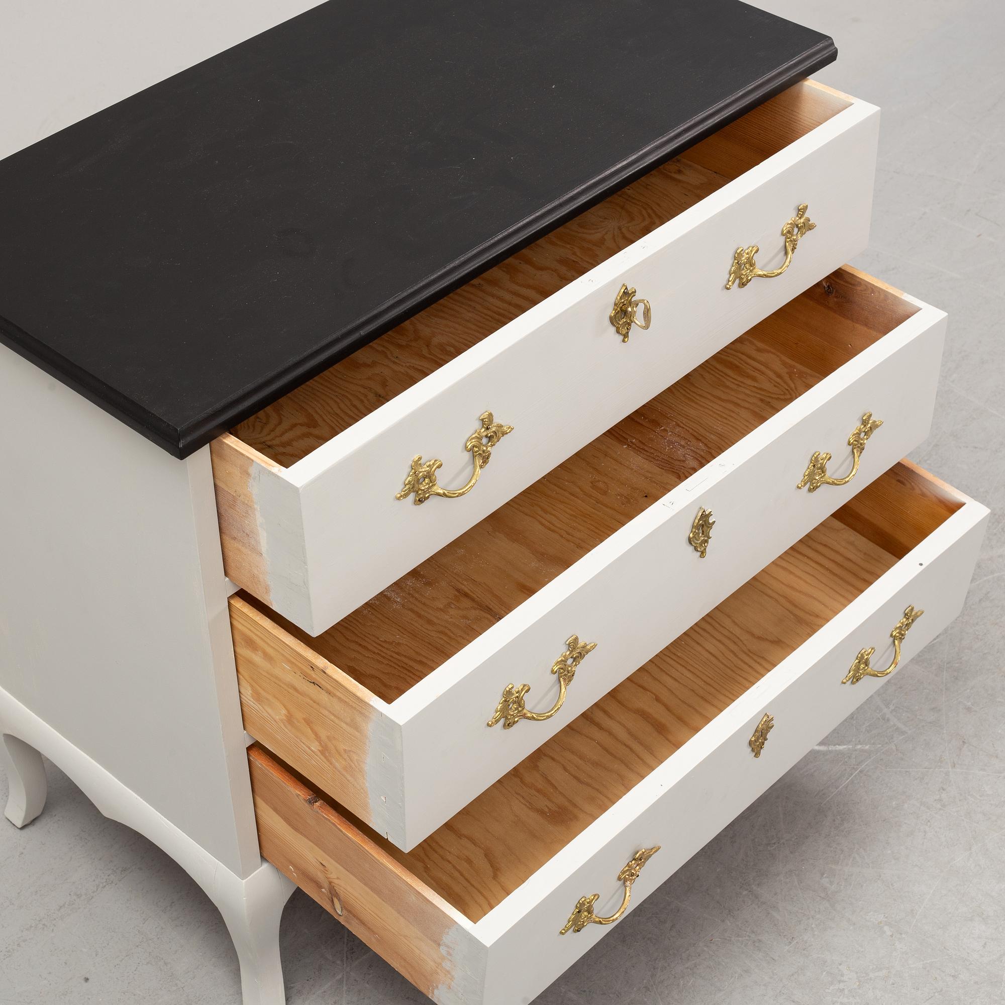 A painted chest of drawers, mid 20th Century.